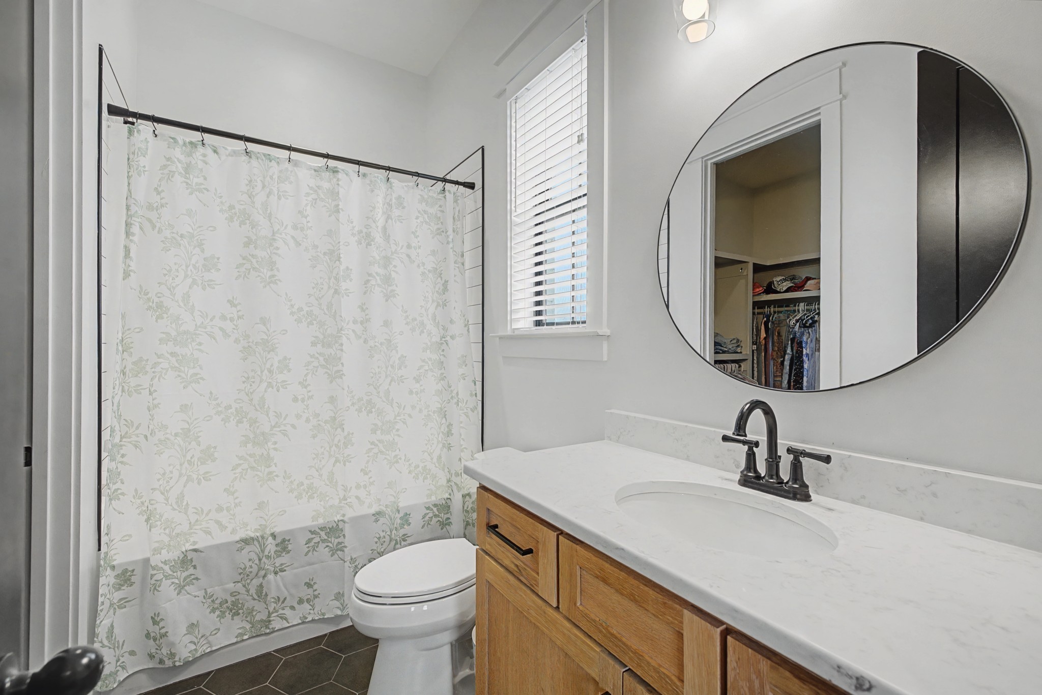 110 Squire Jones Road Bell Buckle, TN 37020 - Photo 42 of 50 a bathroom with a sink a toilet and a mirror