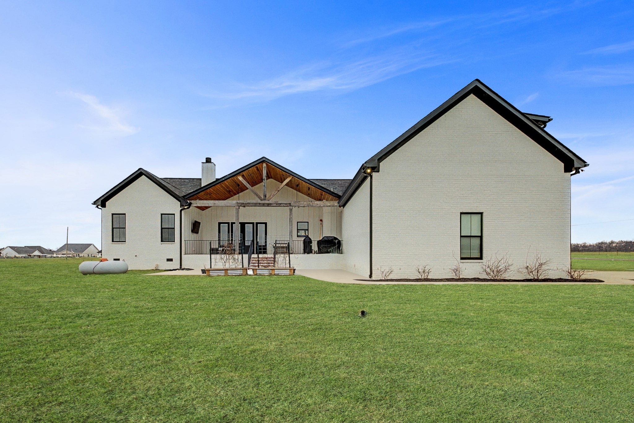110 Squire Jones Road Bell Buckle, TN 37020 - Photo 48 of 50 a front view of a house with a yard and garage