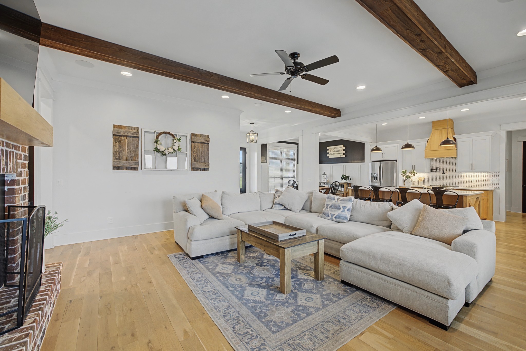 110 Squire Jones Road Bell Buckle, TN 37020 - Photo 9 of 50 a living room with furniture and a view of kitchen
