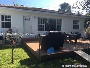 9132 Froude Avenue Surfside, FL 33154 - Photo 14 of 22 a living room with furniture