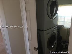 9132 Froude Avenue Surfside, FL 33154 - Photo 16 of 22 a utility room with dryer and washer