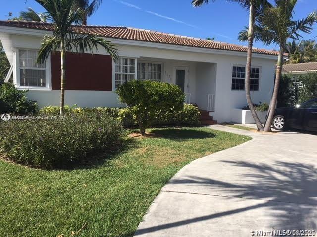 9132 Froude Avenue Surfside, FL 33154 - Photo 4 of 22 front view of a house with a yard