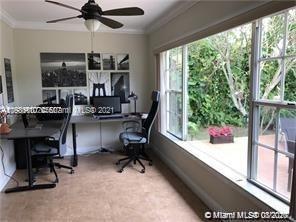 9132 Froude Avenue Surfside, FL 33154 - Photo 10 of 22 a work room with furniture and a large window