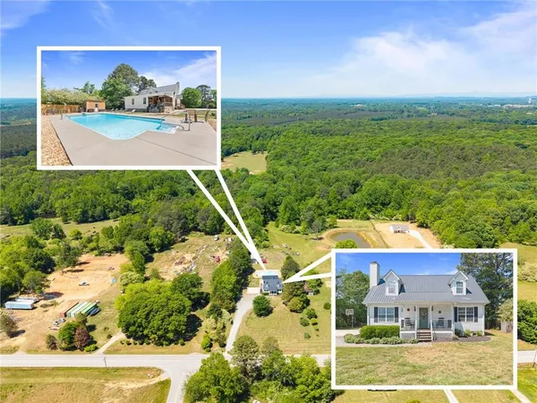 a view of houses with outdoor space and garden