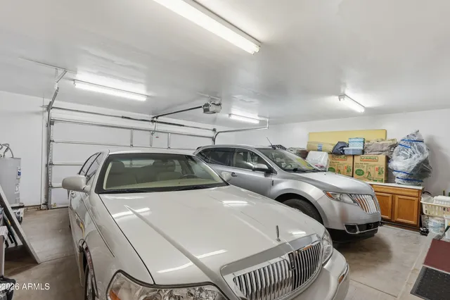 a bedroom with bed and window
