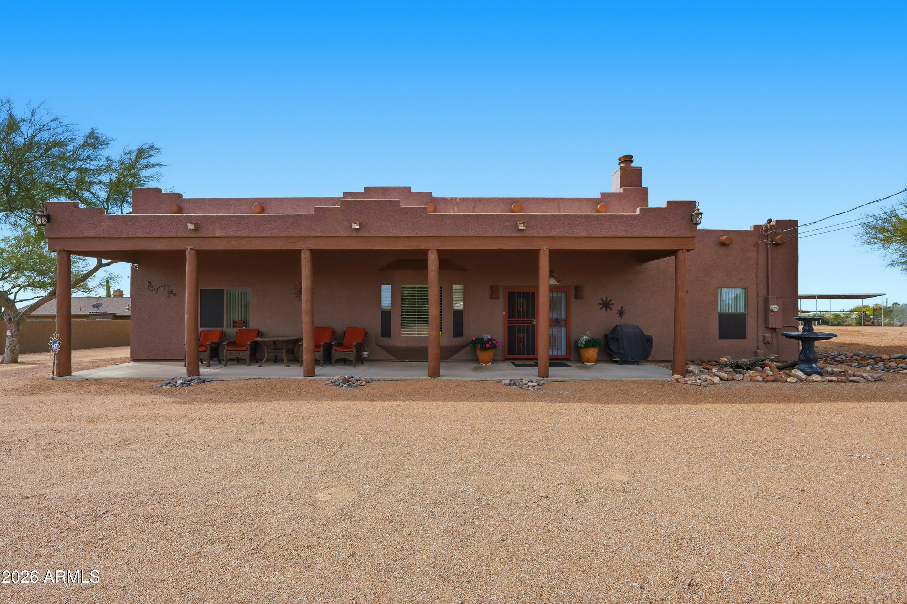 710 South Muleshoe Road Apache Junction, AZ 85119 - Photo 4 of 40 a view of a house with outdoor seating