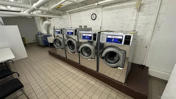 a picture of a room with a bench in it