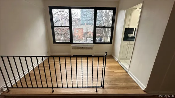 a view of a hallway view with staircase