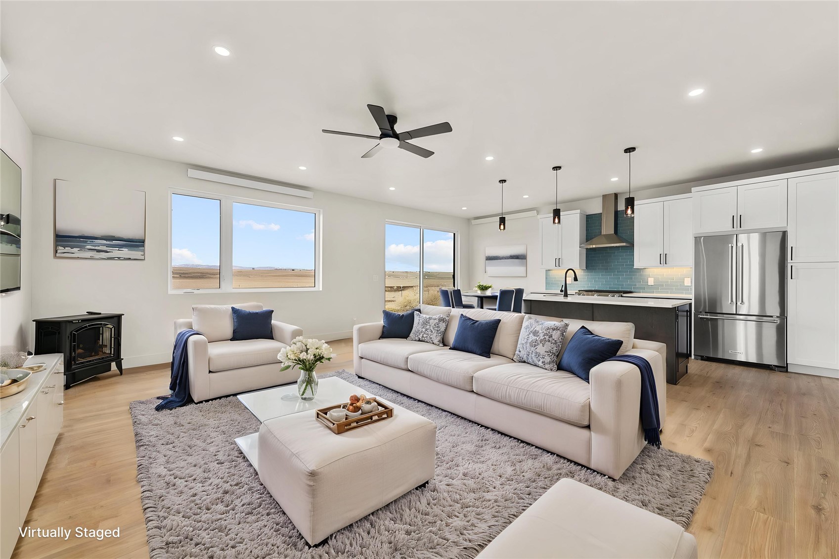 890 Dry Creek Road Hayden, CO 81639 - Photo 3 of 38 a living room with furniture white walls and kitchen view