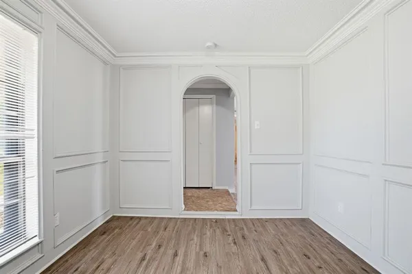 a view of a livingroom with wooden floor