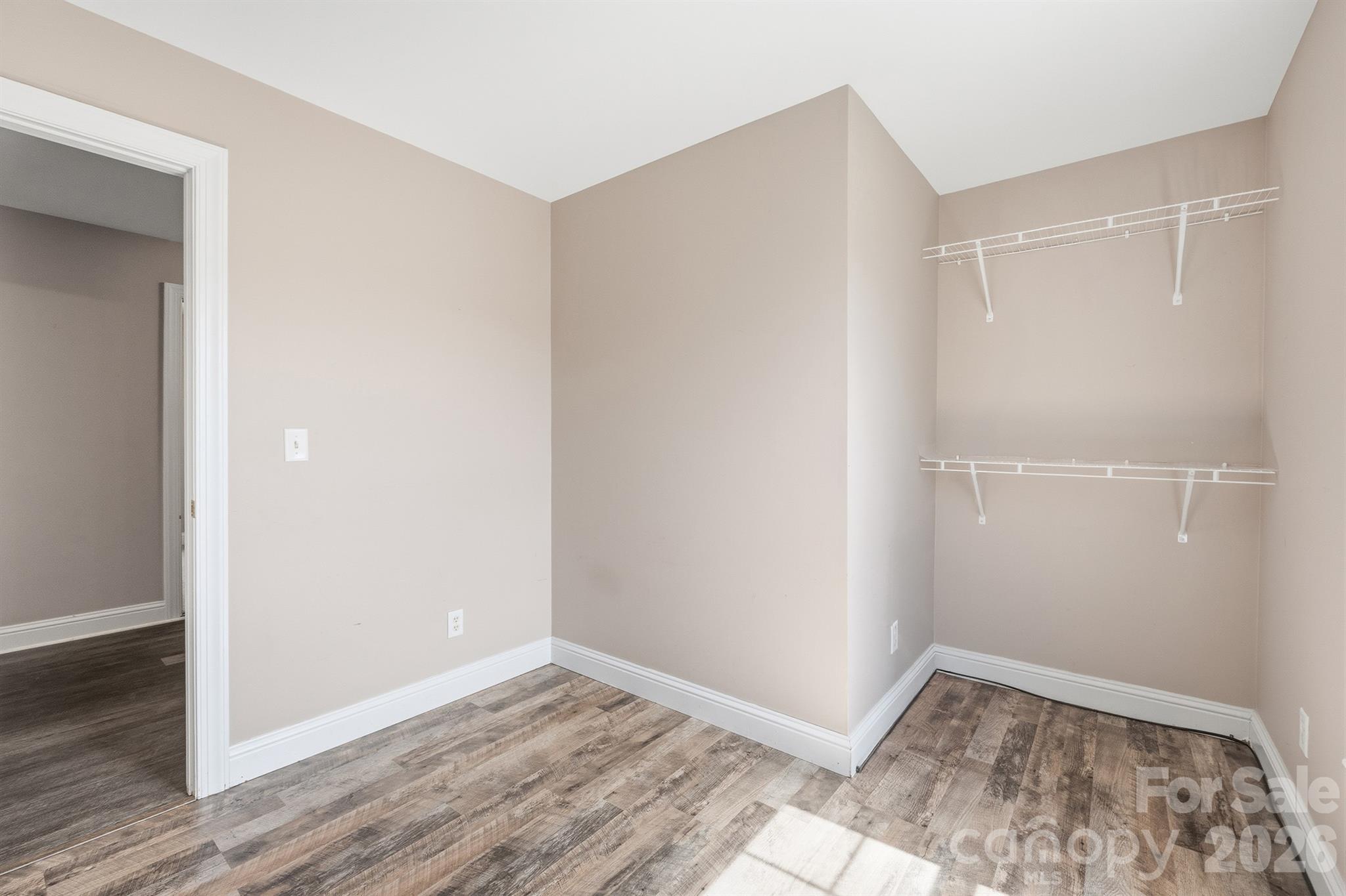 193 Red Hawk Lane Olin, NC 28660 - Photo 12 of 36 a view of hallway with wooden floor