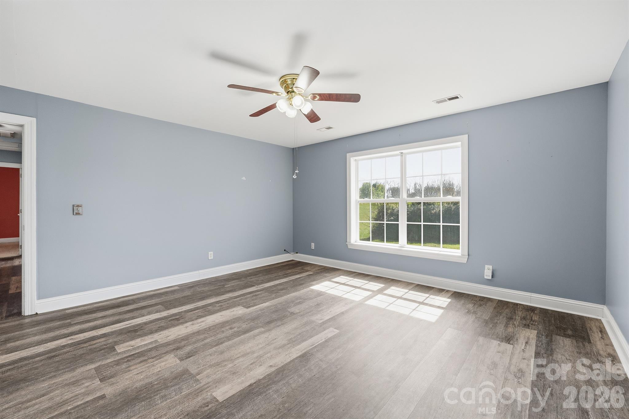 193 Red Hawk Lane Olin, NC 28660 - Photo 13 of 36 a view of an empty room with a window