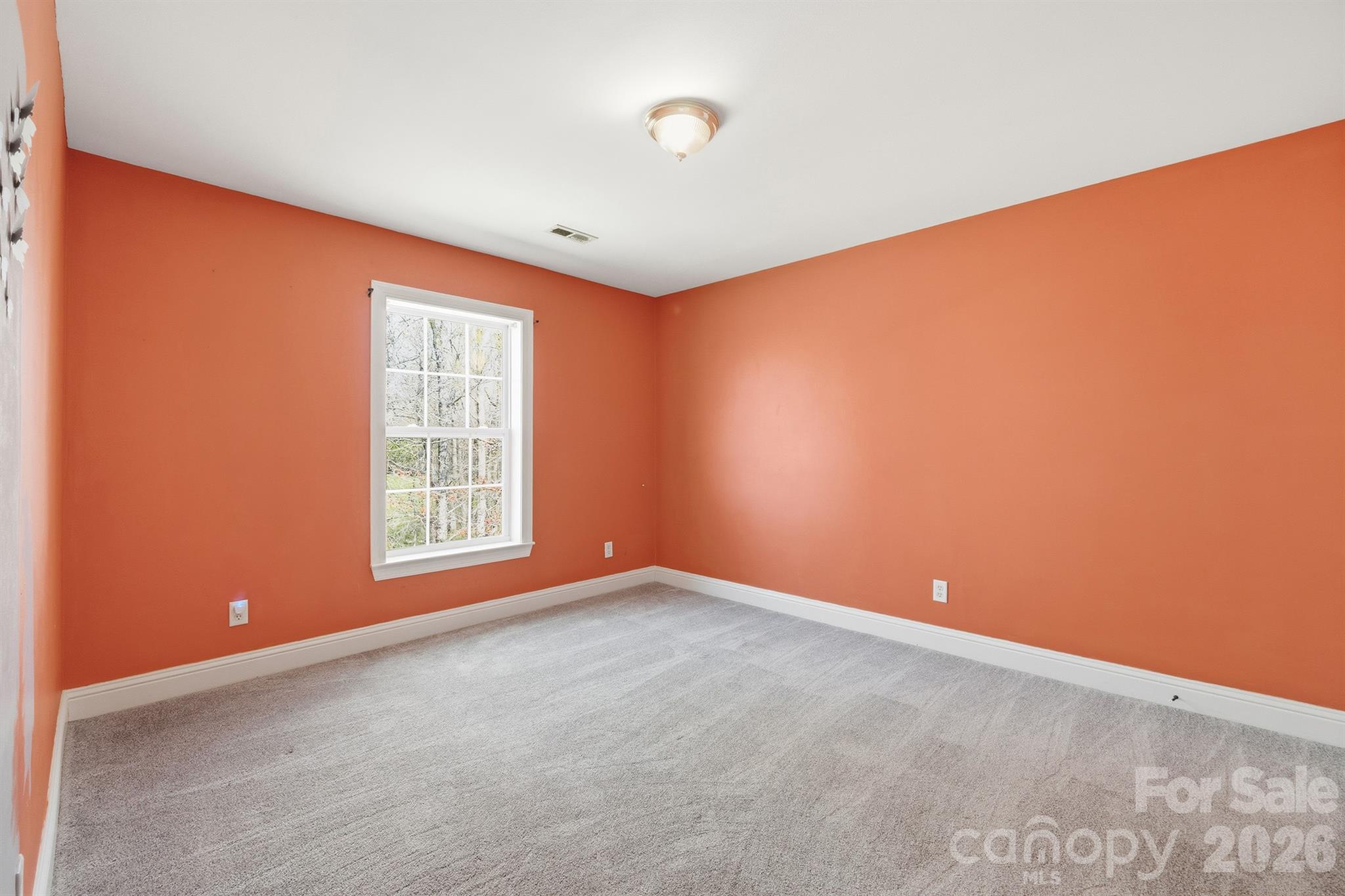 193 Red Hawk Lane Olin, NC 28660 - Photo 19 of 36 an empty room with windows