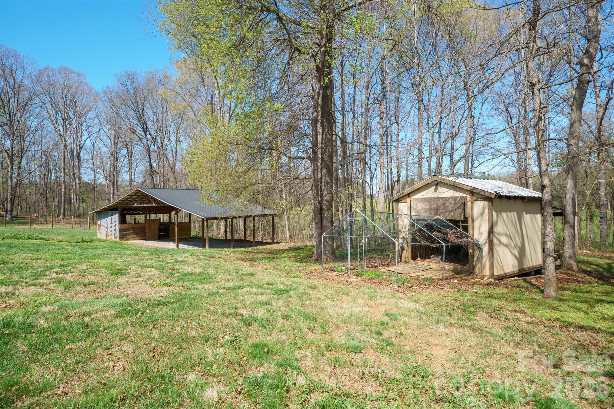 193 Red Hawk Lane Olin, NC 28660 - Photo 25 of 36 a view of a house with a yard