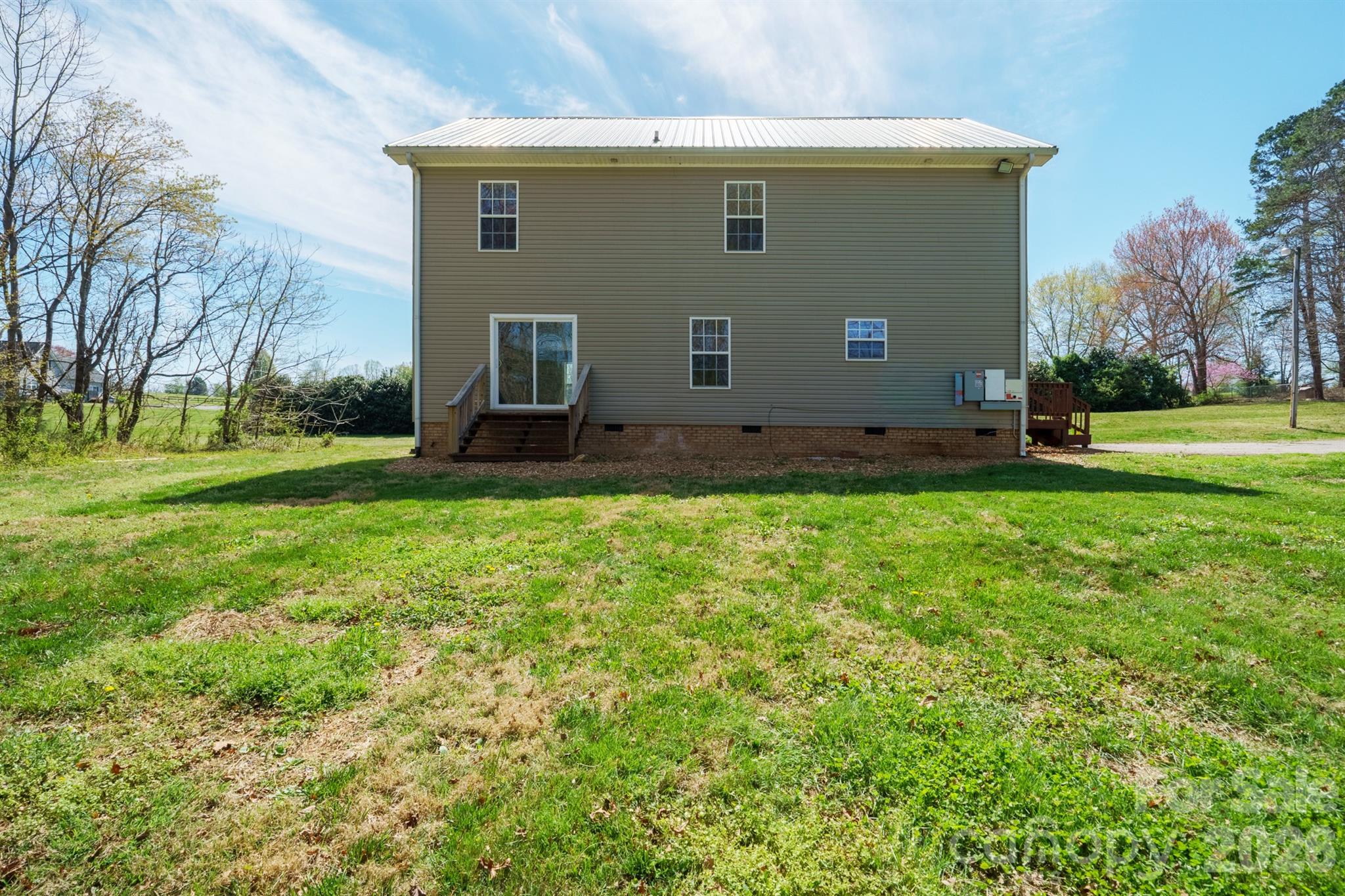 193 Red Hawk Lane Olin, NC 28660 - Photo 26 of 36 a view of a backyard of the house