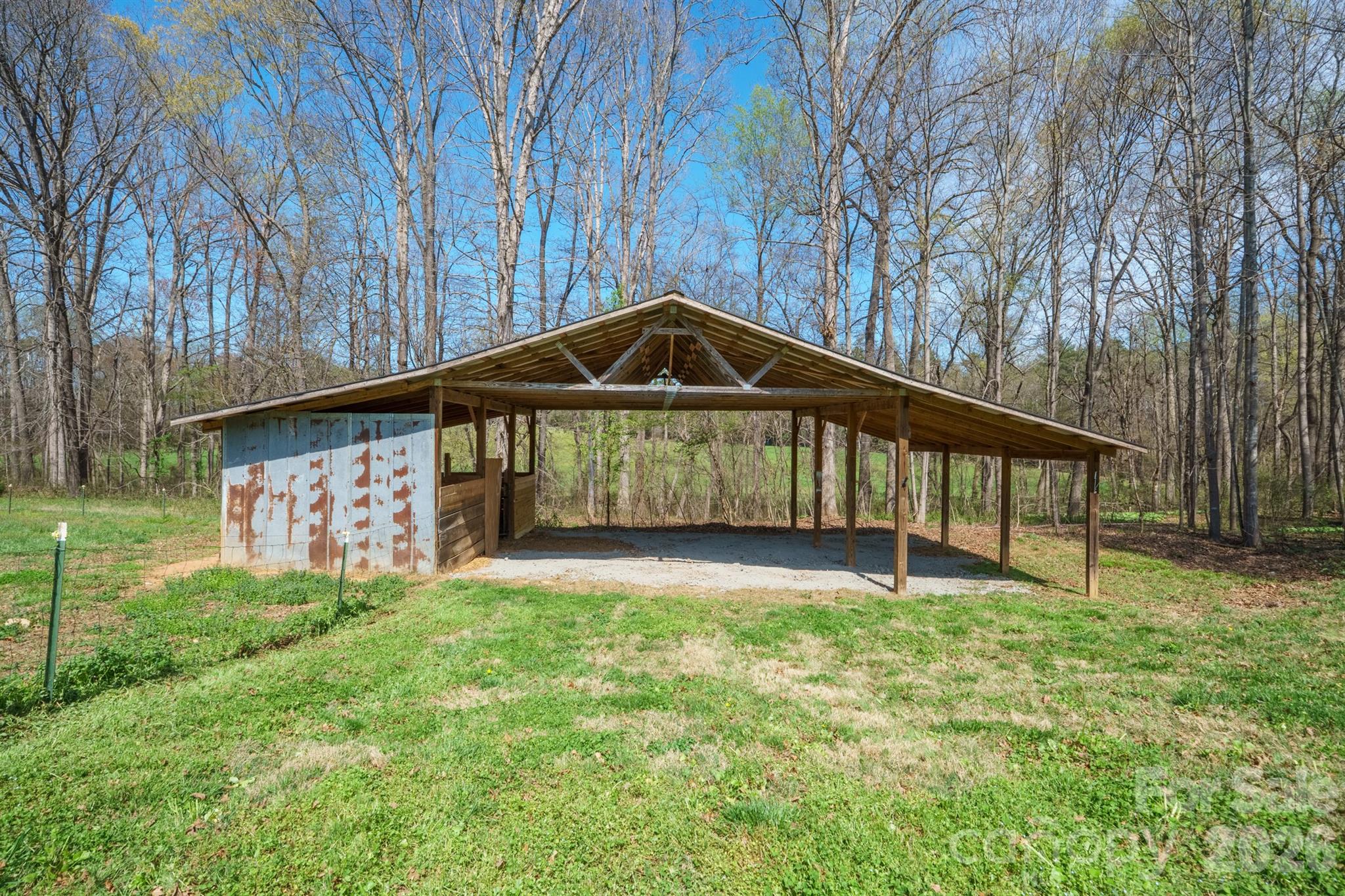 193 Red Hawk Lane Olin, NC 28660 - Photo 27 of 36 a view of a house with a yard
