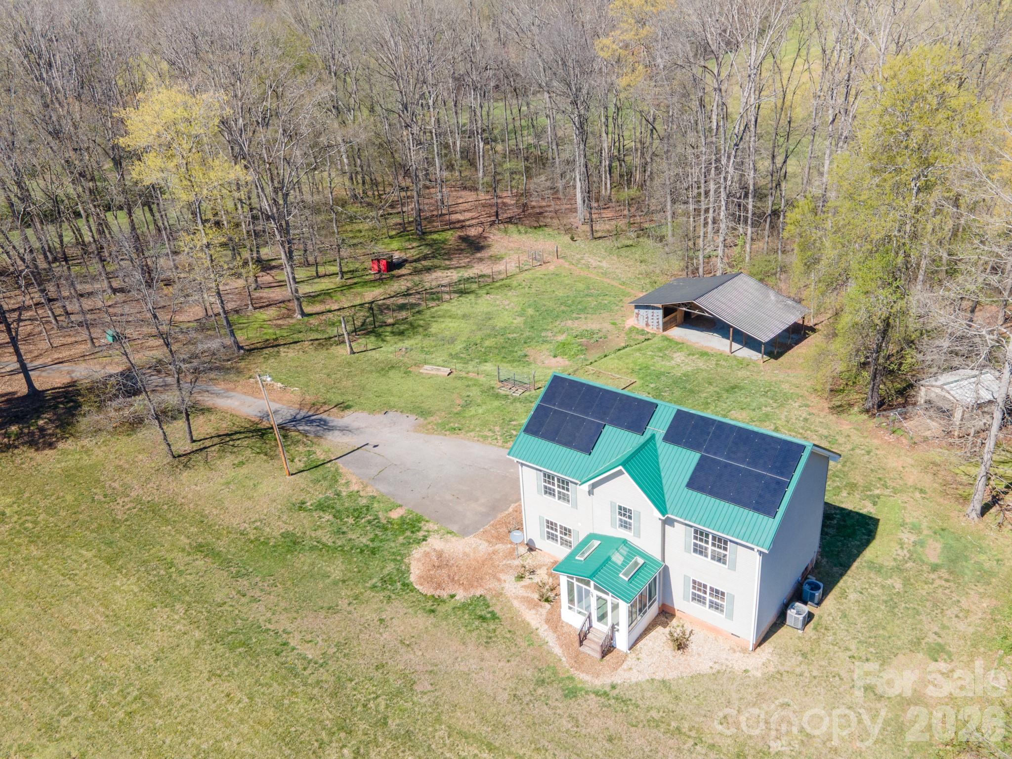 193 Red Hawk Lane Olin, NC 28660 - Photo 32 of 36 swimming pool with outdoor seating