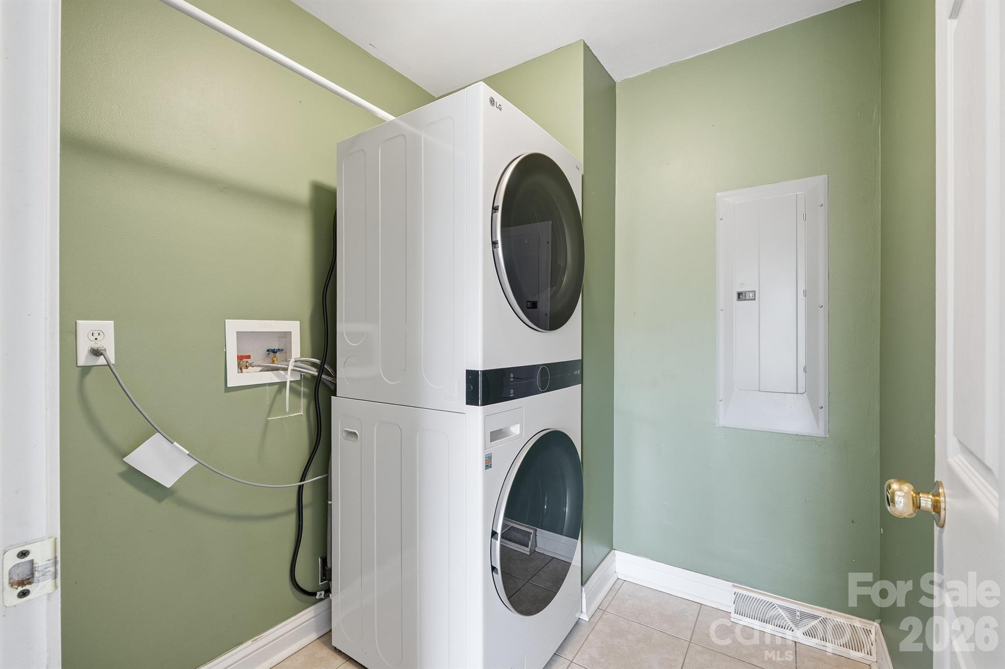 193 Red Hawk Lane Olin, NC 28660 - Photo 10 of 36 a utility room with dryer and washer