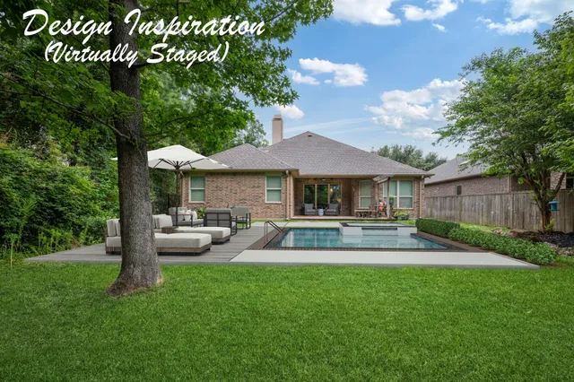 a view of a house with a yard porch and sitting area