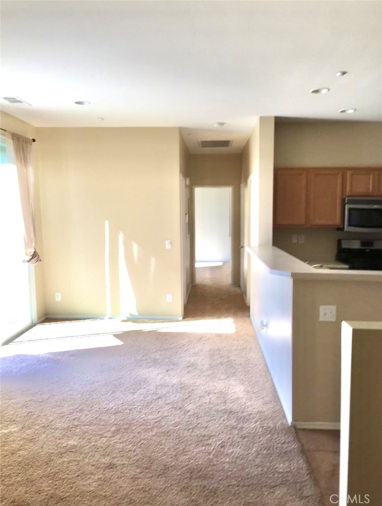 10375 Church Street Rancho Cucamonga, CA 91730 - Photo 5 of 9 a view of a kitchen with a sink and dishwasher