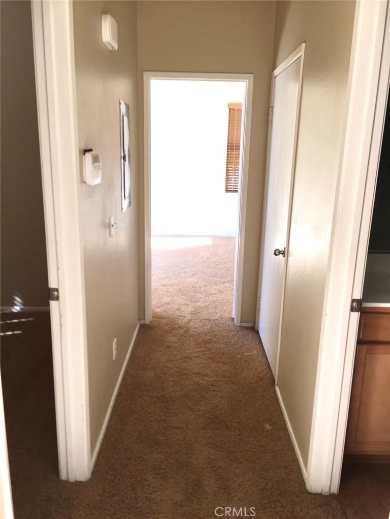10375 Church Street Rancho Cucamonga, CA 91730 - Photo 6 of 9 view of a hallway with wooden floor