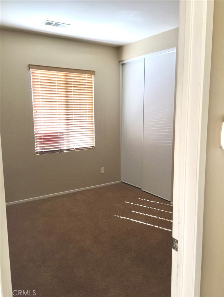 10375 Church Street Rancho Cucamonga, CA 91730 - Photo 7 of 9 a view of an empty room with a window