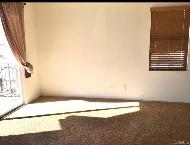 a view of a room with windows