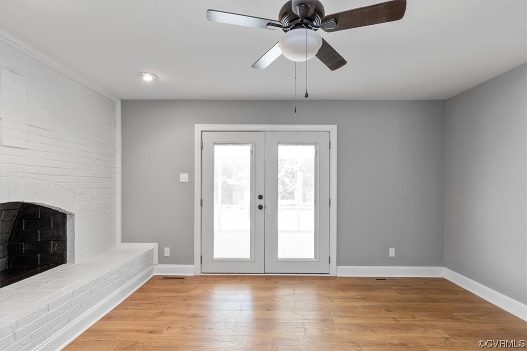 3208 Osborne Road Chester, VA 23831 - Photo 21 of 50 a view of an empty room with a fireplace and a window