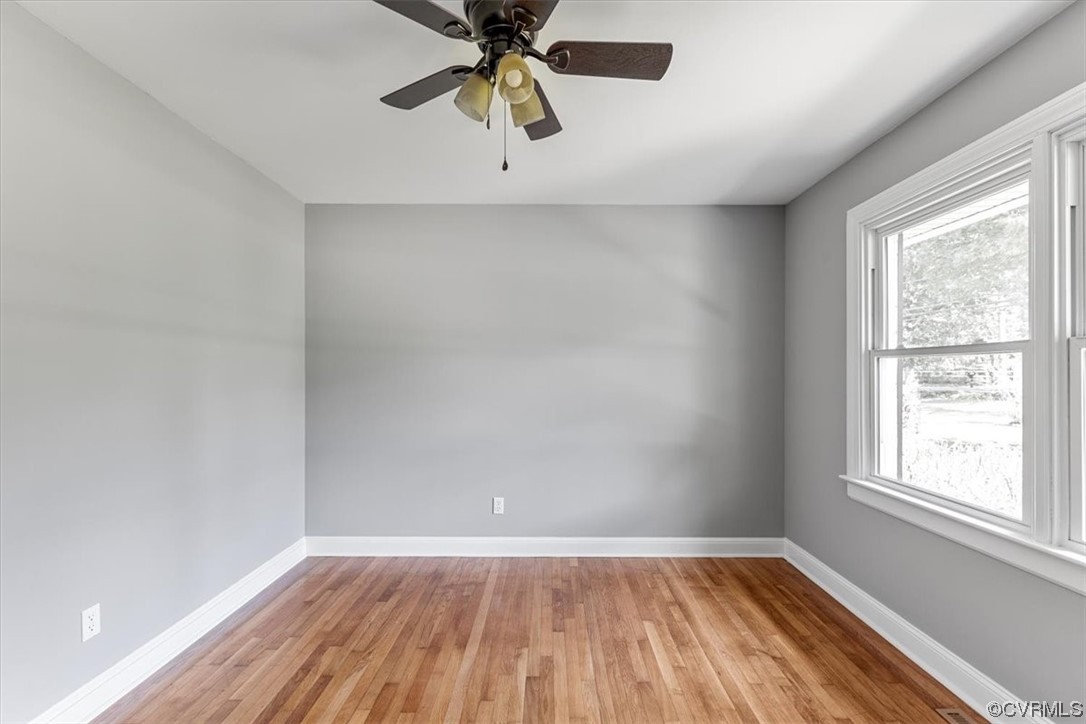 3208 Osborne Road Chester, VA 23831 - Photo 28 of 50 wooden floor in an empty room with a window