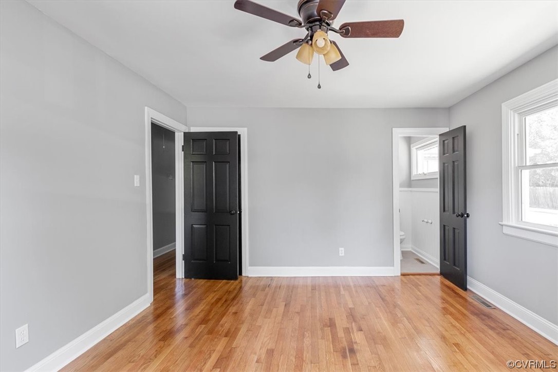 3208 Osborne Road Chester, VA 23831 - Photo 36 of 50 an empty room with wooden floor closet and windows
