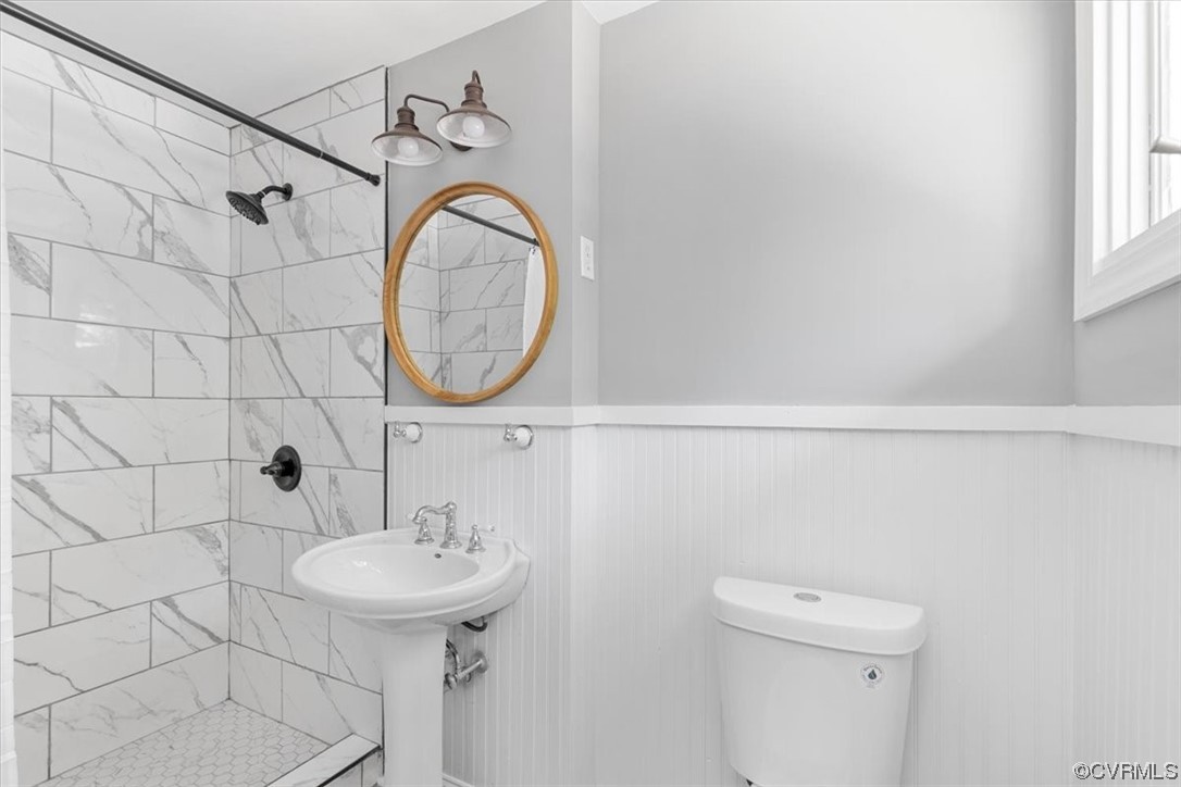 3208 Osborne Road Chester, VA 23831 - Photo 37 of 50 a bathroom with a sink a toilet and a mirror