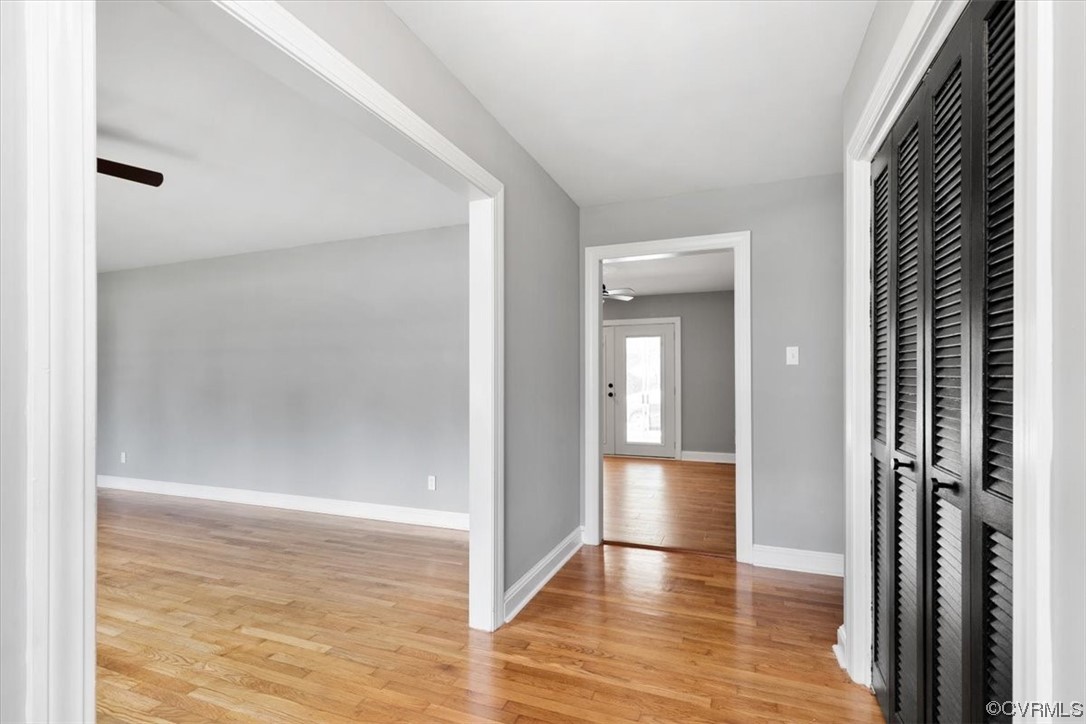 3208 Osborne Road Chester, VA 23831 - Photo 5 of 50 a view of a hallway with wooden floor and a bathroom