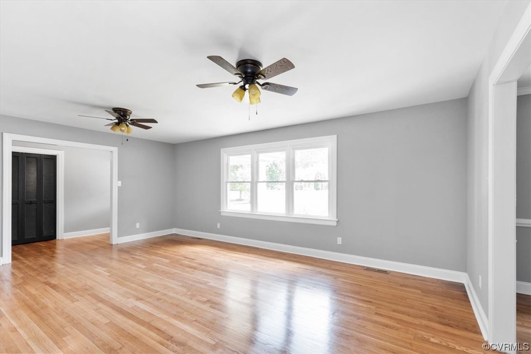 3208 Osborne Road Chester, VA 23831 - Photo 8 of 50 wooden floor in an empty room with a window