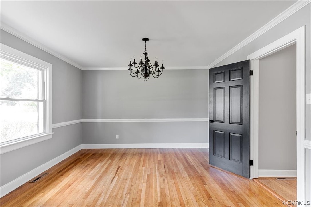3208 Osborne Road Chester, VA 23831 - Photo 9 of 50 wooden floor in an empty room with a window