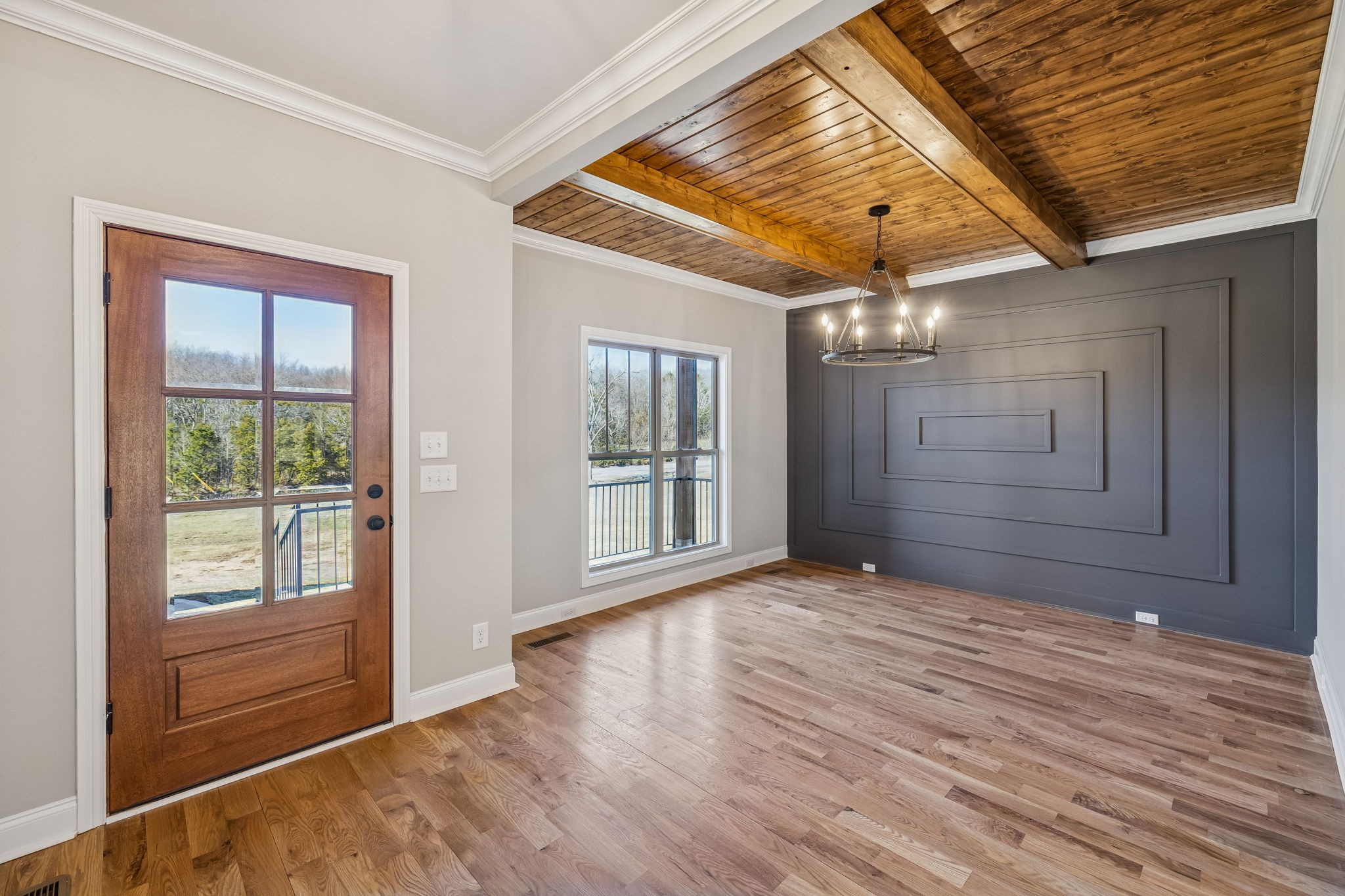 13781 Cainsville Road Lebanon, TN 37090 - Photo 11 of 72 en empty room with wooden floor and windows