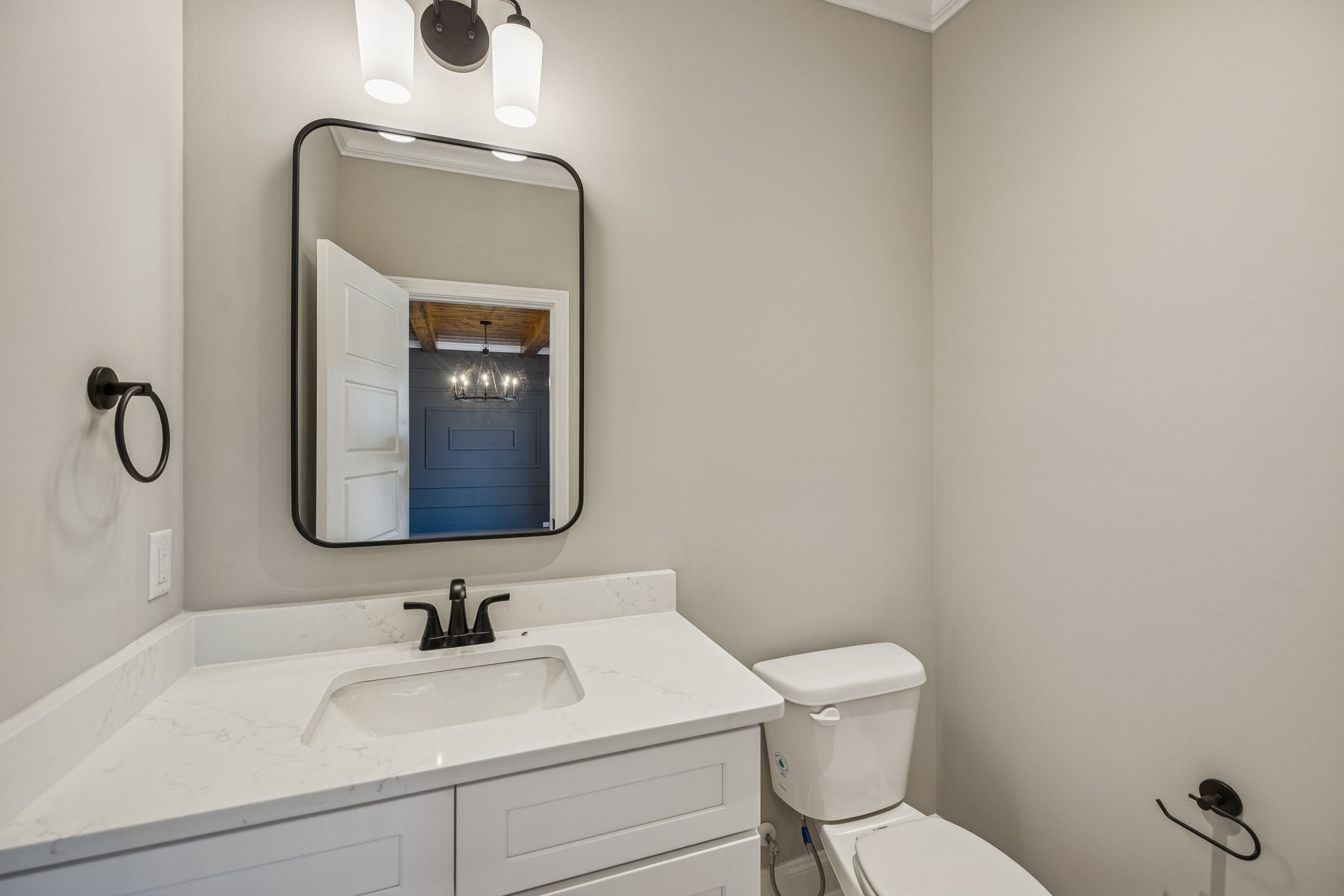 13781 Cainsville Road Lebanon, TN 37090 - Photo 15 of 72 a bathroom with a toilet sink vanity and mirror