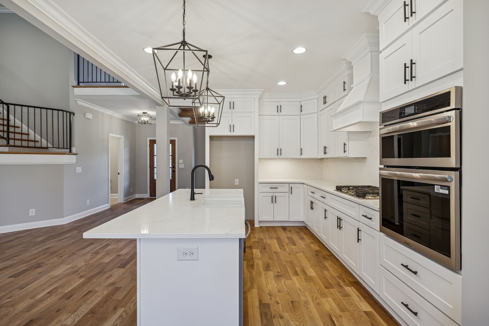 13781 Cainsville Road Lebanon, TN 37090 - Photo 18 of 72 a kitchen with stainless steel appliances a stove sink microwave and cabinets