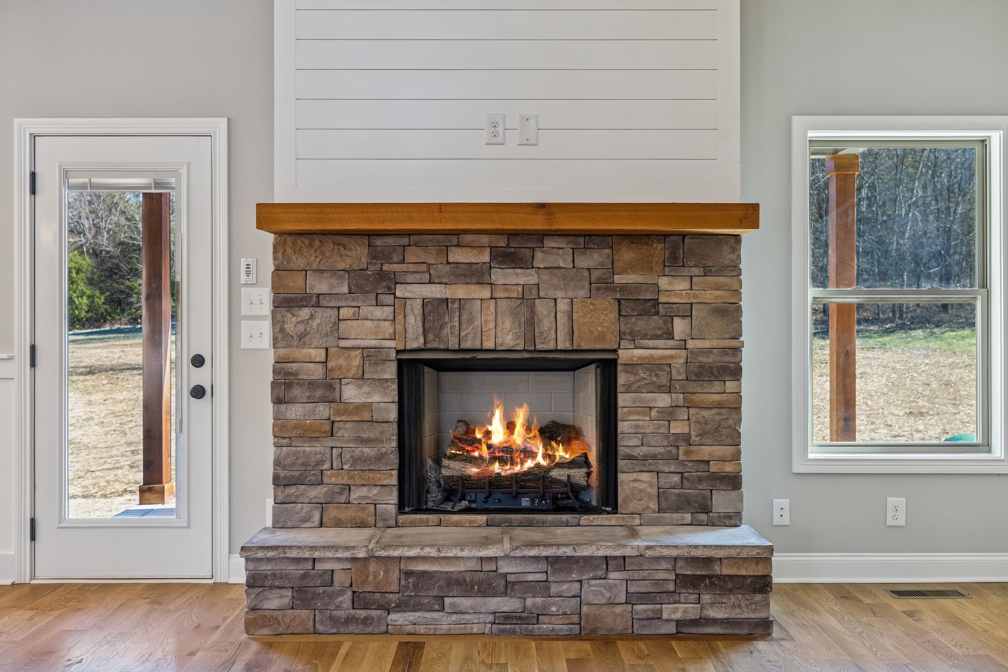 13781 Cainsville Road Lebanon, TN 37090 - Photo 22 of 72 a room with fireplace and a fireplace