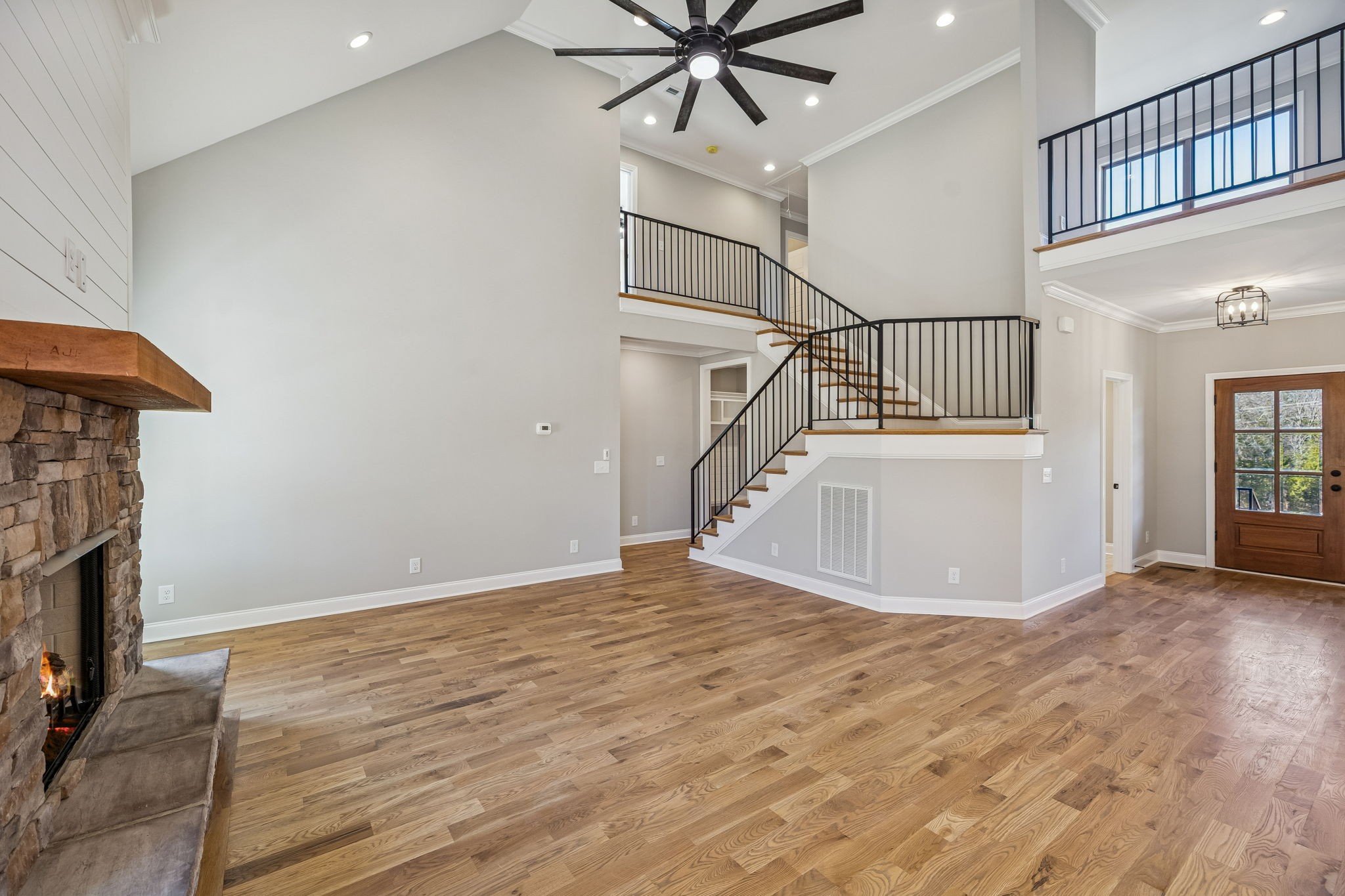13781 Cainsville Road Lebanon, TN 37090 - Photo 25 of 72 a view of a livingroom with wooden floor and a ceiling fan