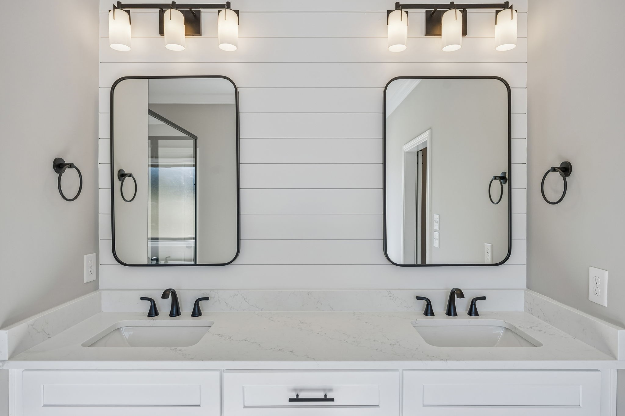 13781 Cainsville Road Lebanon, TN 37090 - Photo 30 of 72 a bathroom with double vanity sinks and a mirror