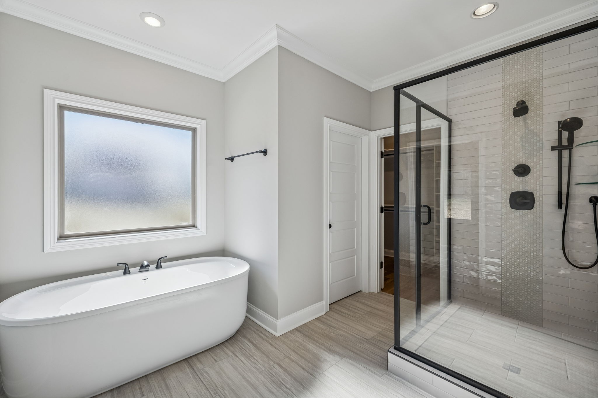 13781 Cainsville Road Lebanon, TN 37090 - Photo 31 of 72 a bathroom with a bathtub and a shower