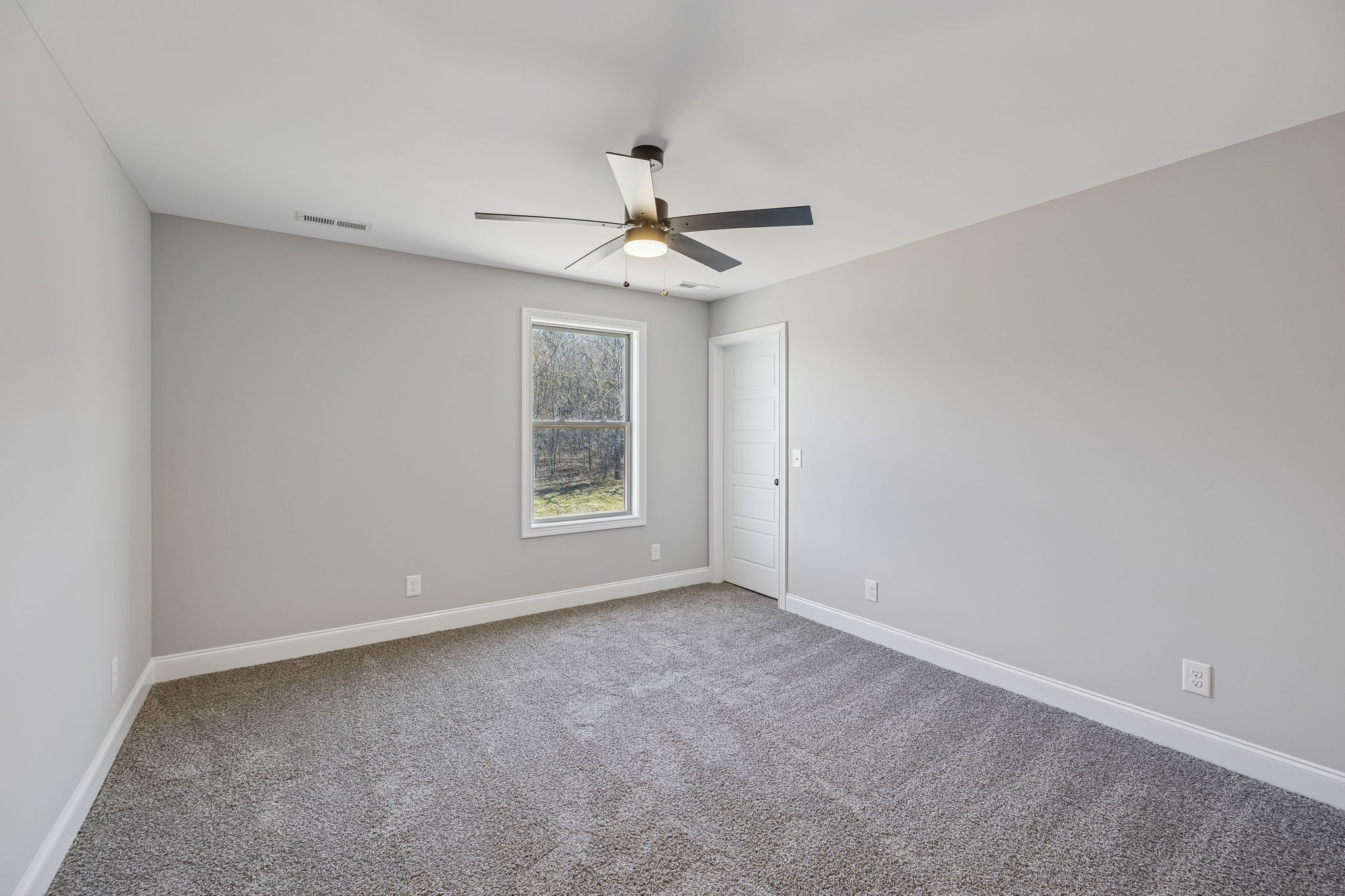13781 Cainsville Road Lebanon, TN 37090 - Photo 38 of 72 an empty room with windows and fan