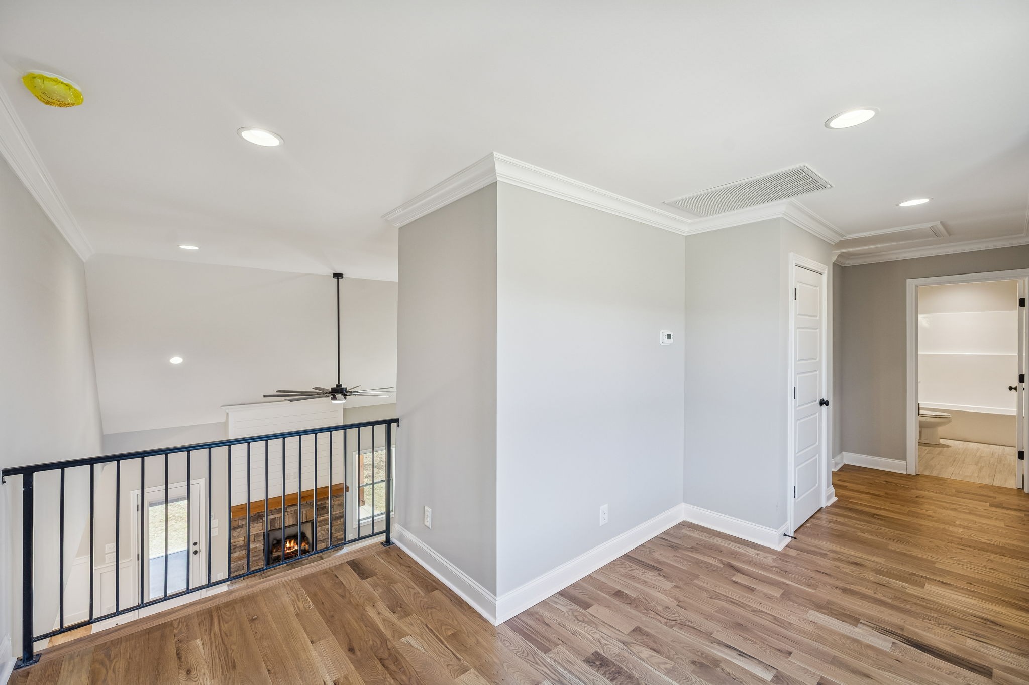 13781 Cainsville Road Lebanon, TN 37090 - Photo 51 of 72 a view of hallway with a room and wooden floor