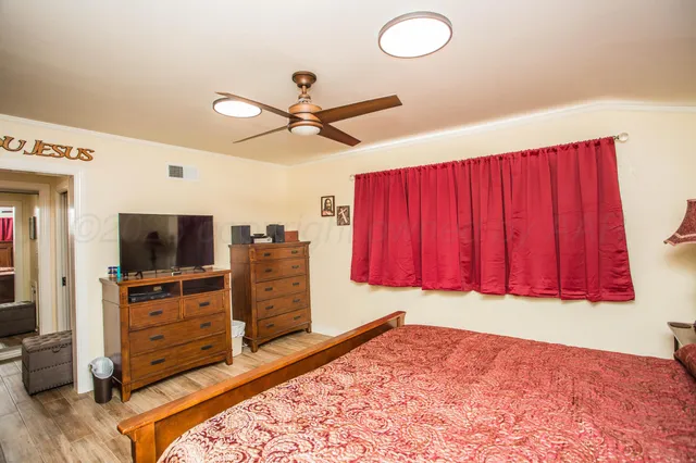 a bathroom with a shower sink and mirror