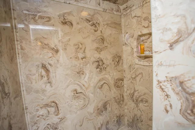 a view of a house with wooden fence