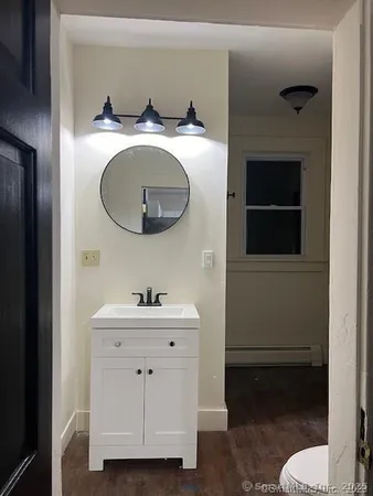 a bathroom with a sink and a toilet