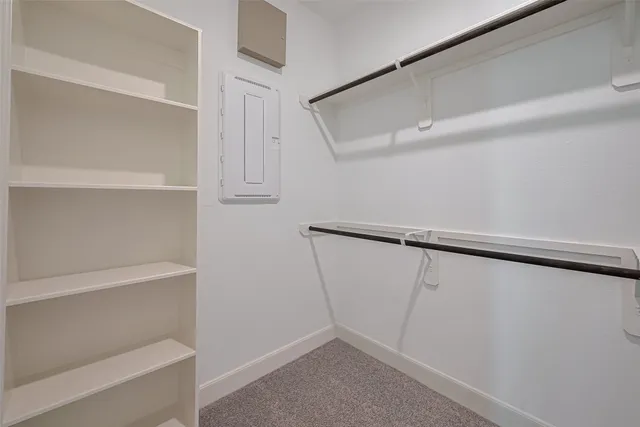 a view of an empty walk in closet