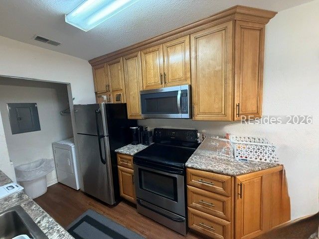 897 Fording Island Road, Unit 2104 Bluffton, SC 29910 - Photo 2 of 19 Kitchen plus laundry room