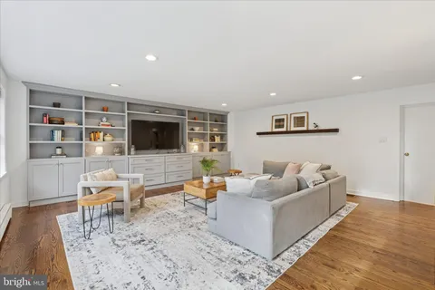 a view of a patio with a table and chairs