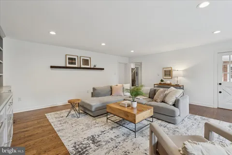 a view of outdoor dining space with a table and chairs